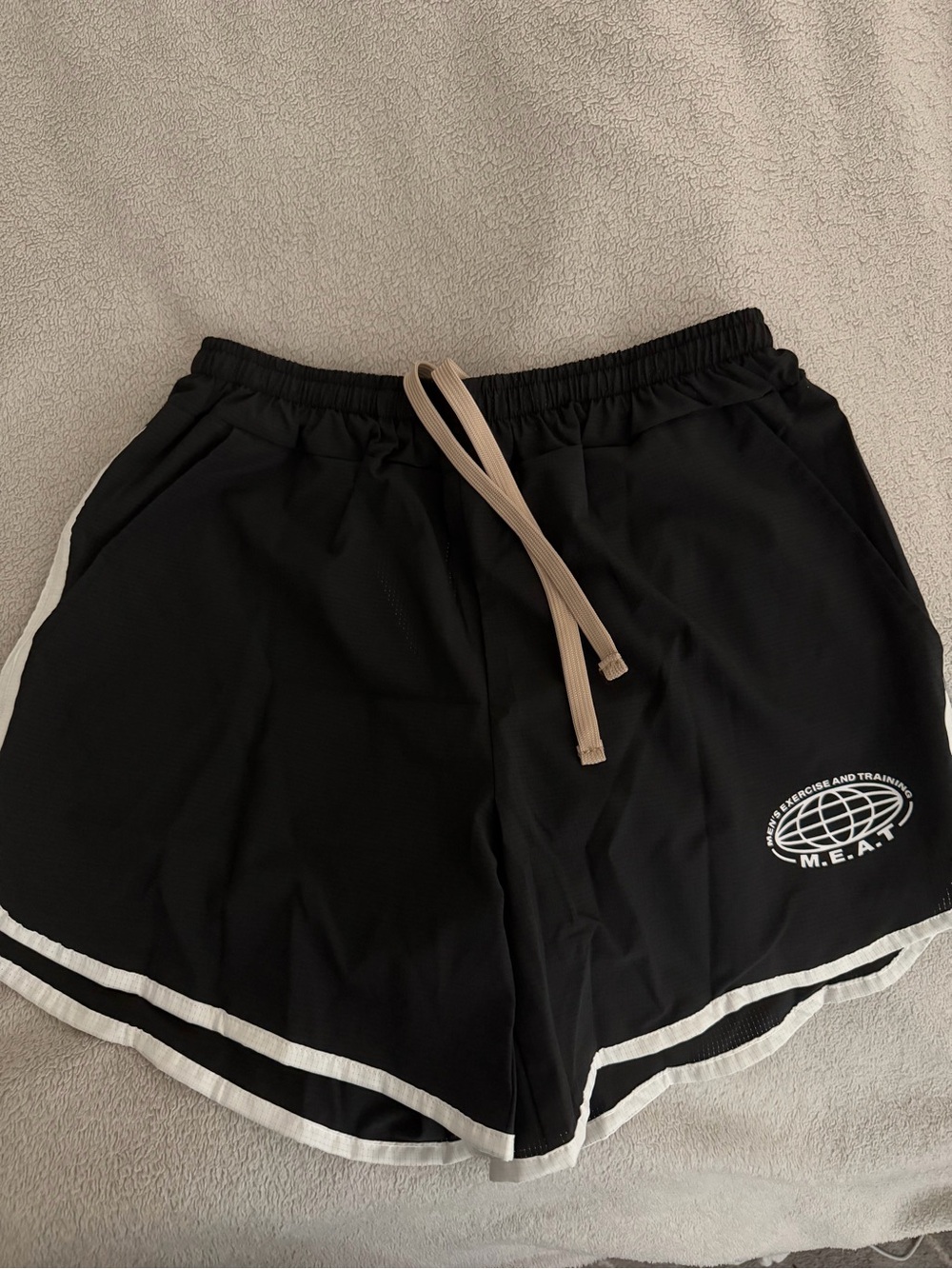 Men's Black Athletic Shorts with White Trim and Beige Drawstring